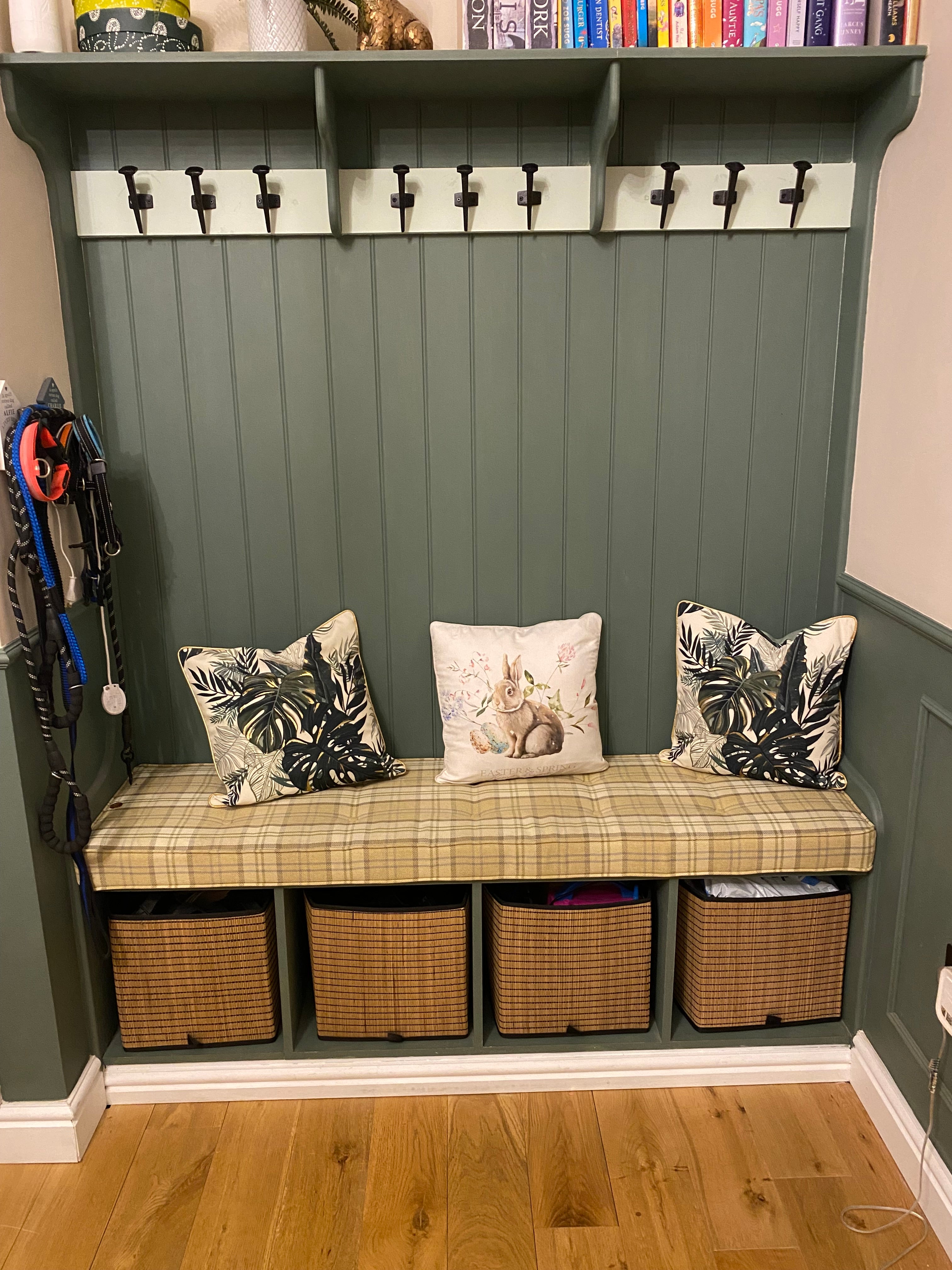 Boot room seat with coat stand.