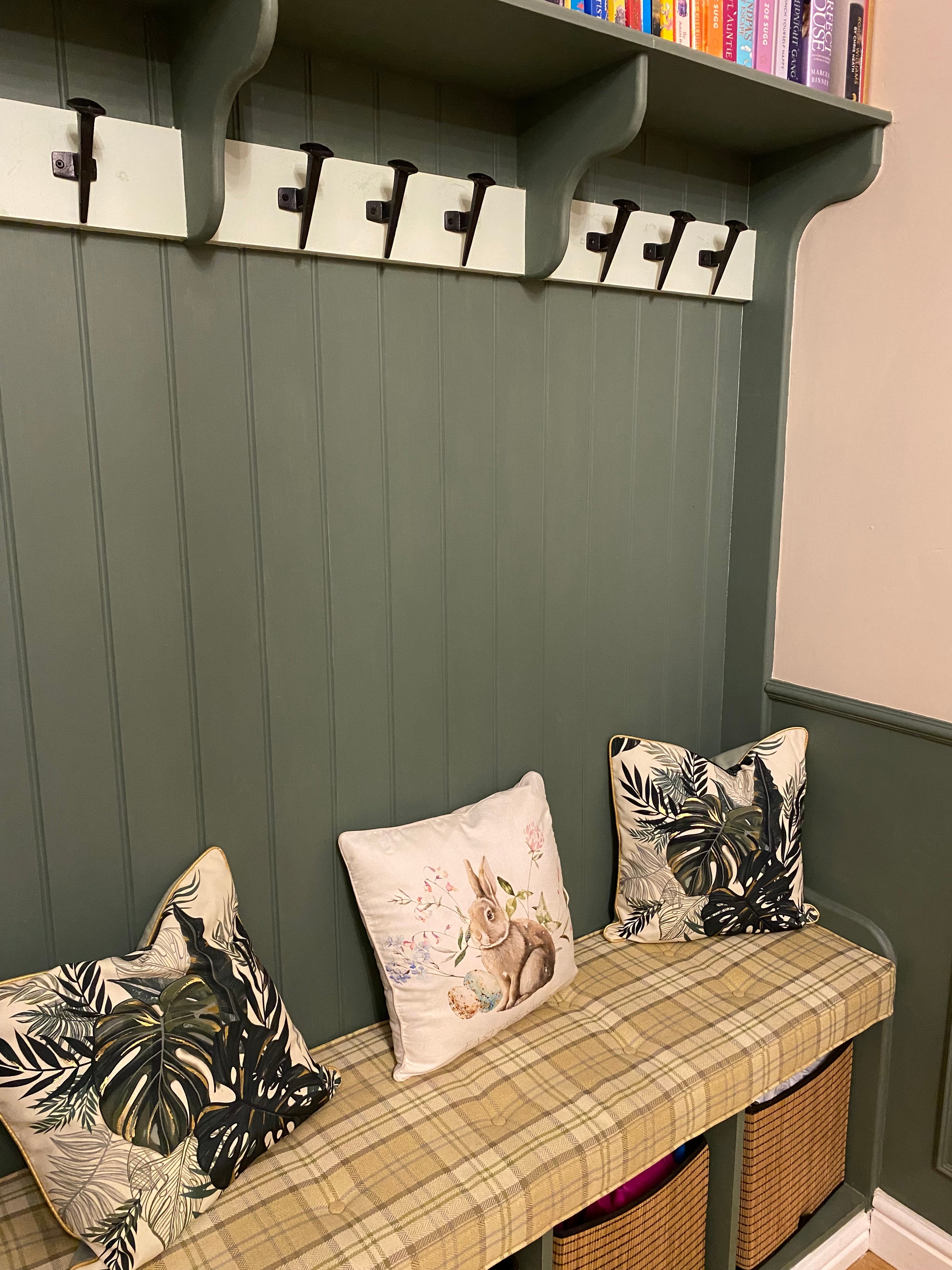 Boot room seat with coat stand.