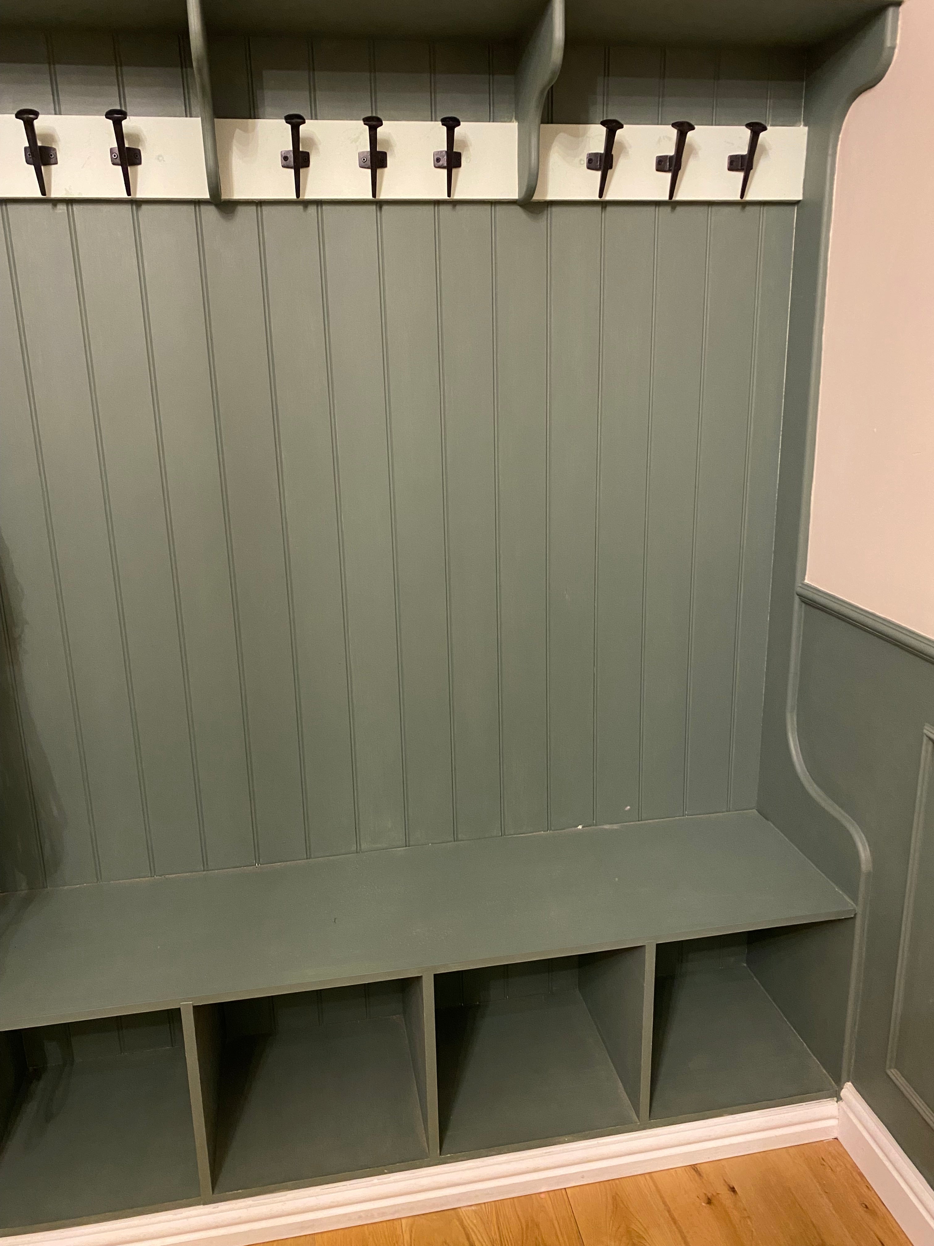 Boot room seat with coat stand.